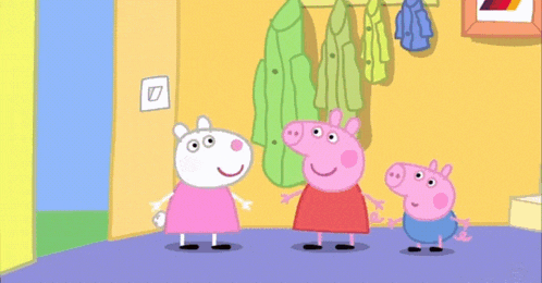 three peppa pigs standing next to each other in a hallway
