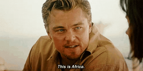 a man is talking to a woman and saying this is africa .