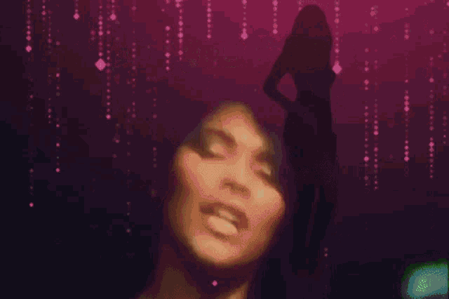 a woman is standing in front of a purple background that says " do you think "