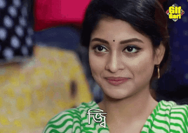 a close up of a woman 's face with the word gif on the bottom