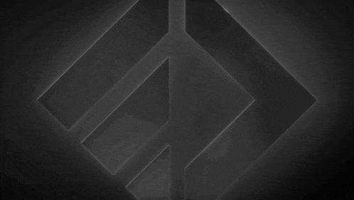 a black background with a triangle in the middle of it