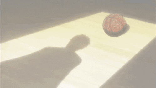a basketball is being thrown by a person
