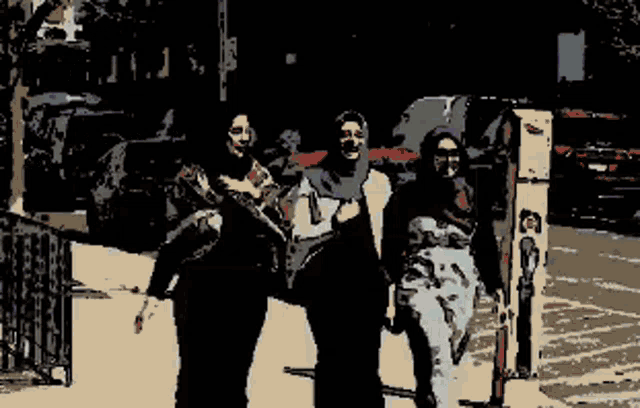 a group of people walking down a street with orang yang paling bahagia adalah