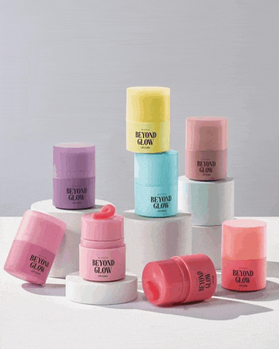 a variety of beyond glow products are displayed on a table