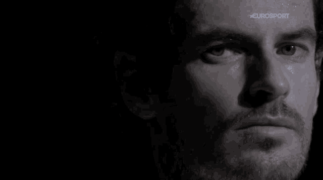 a close up of a man 's face with eurosport written on the bottom right corner