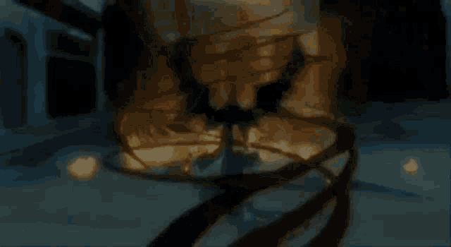 a close up of a person 's face with a smile on it 's face .