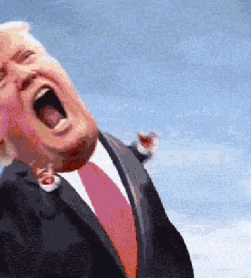 a man in a suit and tie screaming with his mouth open