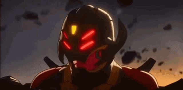a close up of a robot with red lights on his face .