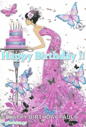 a woman in a pink dress blowing out candles on a birthday cake surrounded by butterflies