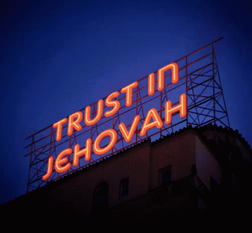 a neon sign that says trust in jehovah on it