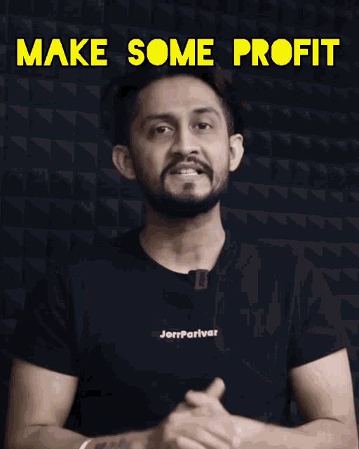 a man wearing a black shirt with the words make some profit written on it