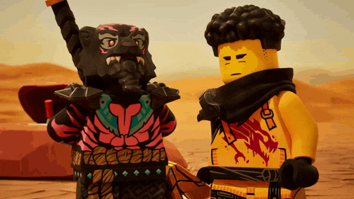 two lego figures are standing next to each other and one has the letter c on his shirt