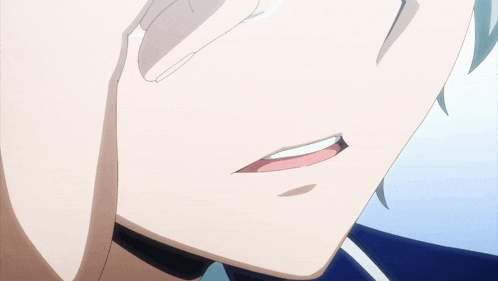 a close up of a person 's face with a smile