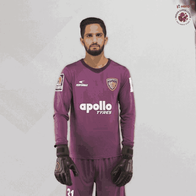 a man wearing a purple jersey with the word apollo on it