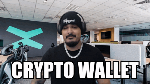 a man wearing a beanie and headphones says crypto wallet