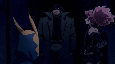 a man and a girl are standing in the dark