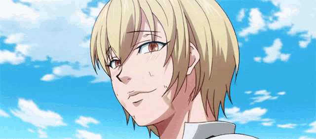 a close up of a person 's face with the sky in the background