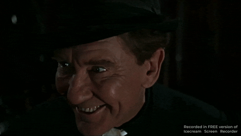 a close up of a man 's face with the words i prefer evil on the bottom