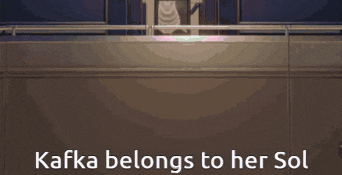 a person holding an umbrella with the words kafka belongs to her sol
