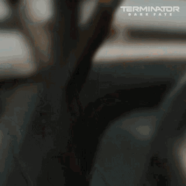 a movie poster for terminator dark fate shows a person driving a car