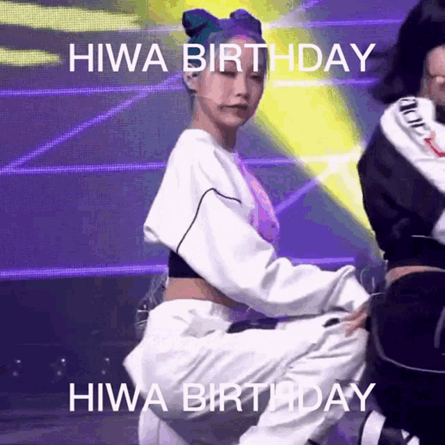 a girl with blue hair is kneeling down on a stage with the words hiwa birthday written above her