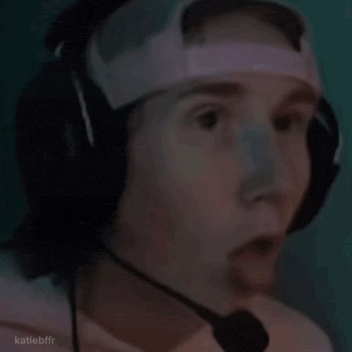 a close up of a white cat making a surprised face