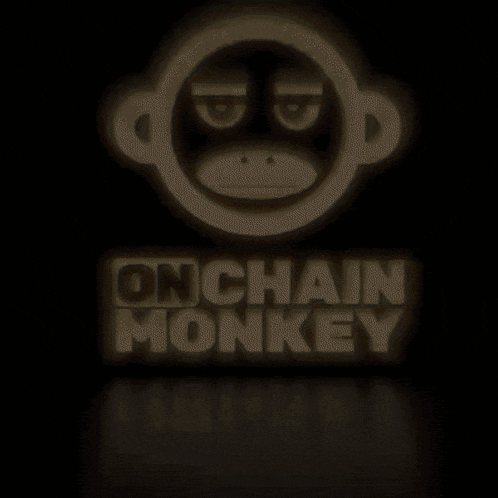 a glowing on chain monkey logo with a monkey face