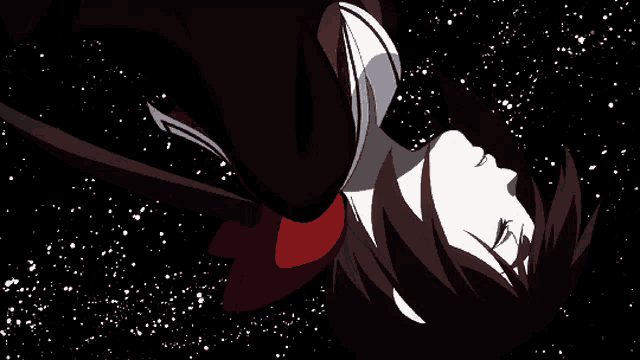 a person is laying on their back in the dark
