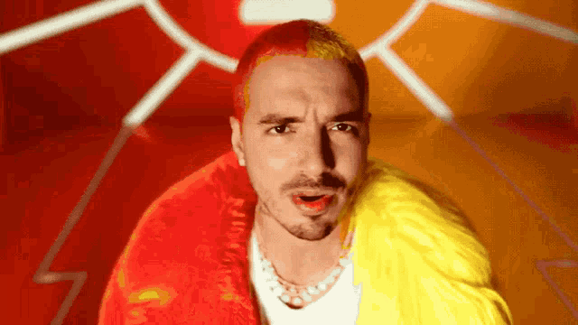 a man with red hair wearing a yellow fur coat
