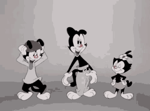 a group of black and white cartoon characters are dancing together