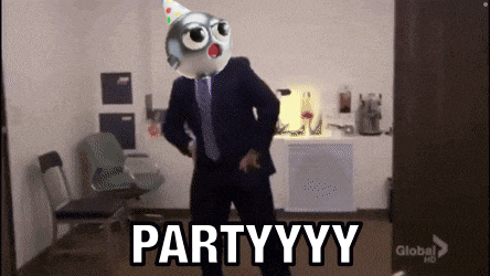 a man in a suit and tie is dancing in a room with the words partyyyy on the floor