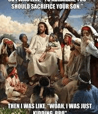 jesus is sitting in front of a group of people holding a baby and talking to them .