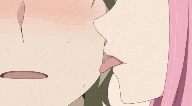 a girl with pink hair kissing a boy on the cheek
