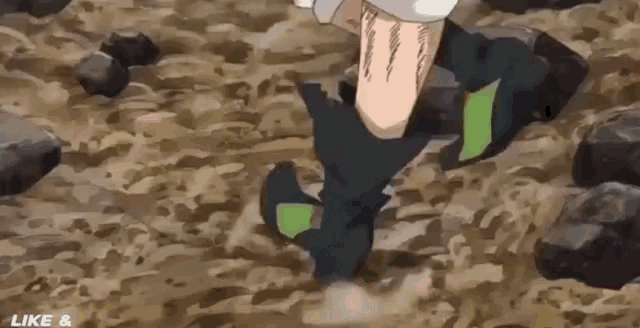 a person is running on a dirt road with rocks .