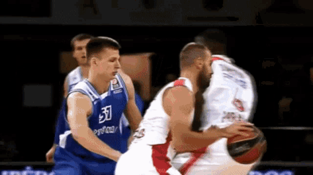 a basketball player wearing a blue jersey with the number 39 on it
