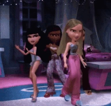 a group of dolls are dancing in a room