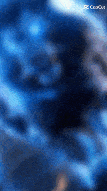 a blue background with a capcut logo on the bottom