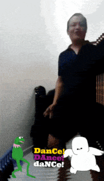 a man is standing next to a kermit frog with the words dance dance dance on the bottom