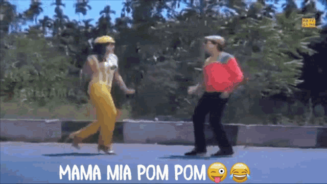 a video of a man and woman dancing with the words mama mia pom pom on the bottom