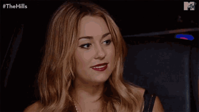 a woman says " yeah but it 's fun " in front of a mtv logo