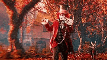 mad hatter from alice in wonderland is standing in a forest holding a teapot .