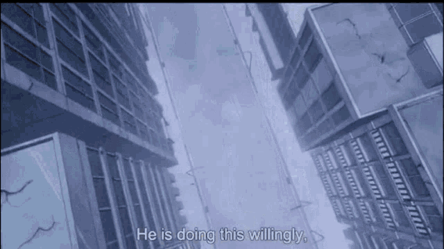 a very tall building with the words he is doing this willingly on the bottom