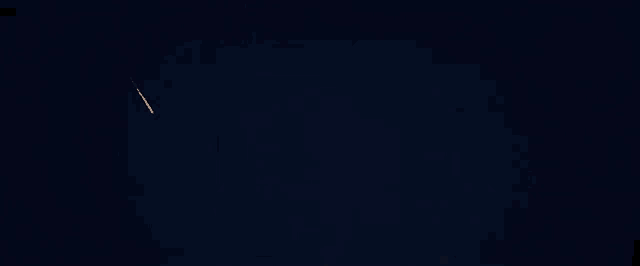 a jet is flying through the night sky