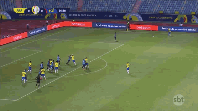 a soccer game is being played in a stadium with ads for betsson.com