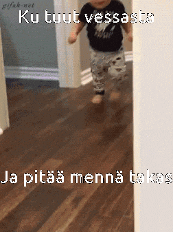 a baby is running in a hallway with the words ku tuun vessasta