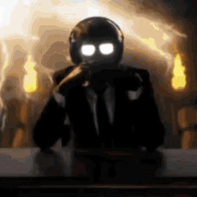 a silhouette of a man in a suit and tie sitting at a table