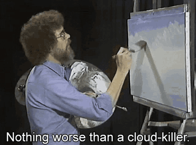 a man is painting on a canvas with the words nothing worse than a cloud-killer below him