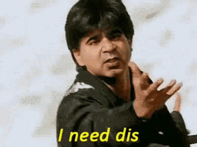 a man in a black jacket is making a funny face and says `` i need dis '' .