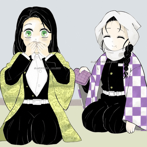 a girl with green eyes is covering her mouth while a girl in a purple and white checkered coat is smiling