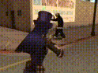 a blurry picture of a person walking down a street